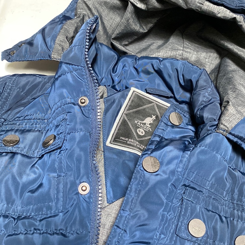 Boys light coat.